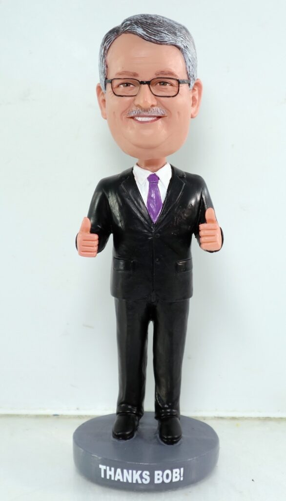 Finished custom CEO retirement bobblehead of Bob Jameson with a personalized Thanks Bob base.